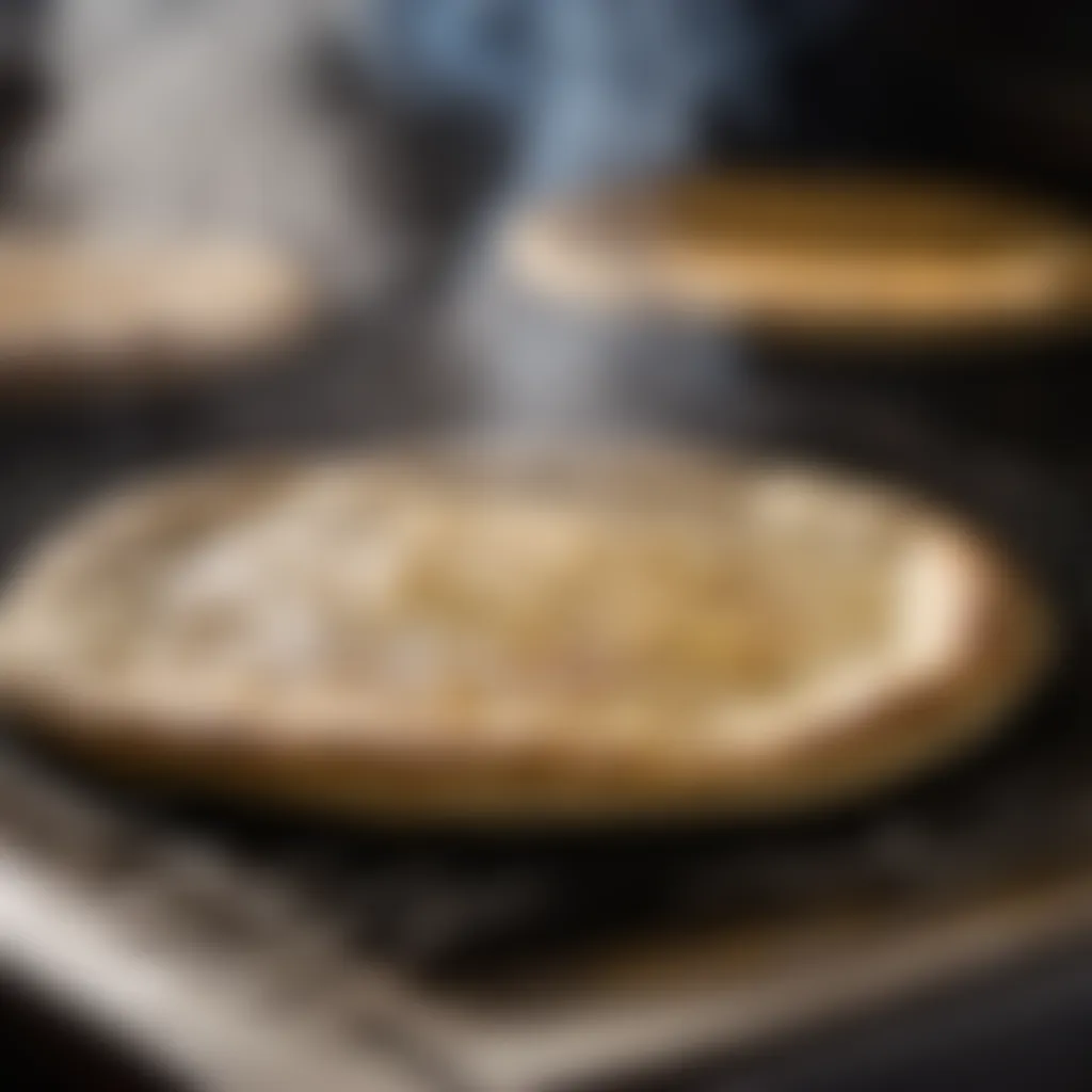 Golden-brown homemade flatbread cooking on a hot griddle